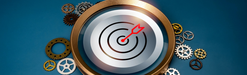 Cible rouge au centre d’un mécanisme d’engrenages, symbolisant la précision dans la mesure de l’efficacité de votre stratégie marketing.